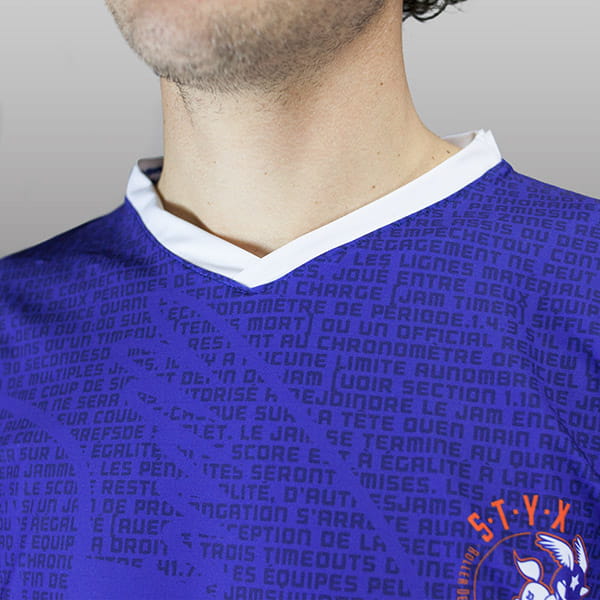 purple shirt with white v collar