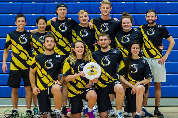 team wearing black and yellow sublimated jerseys