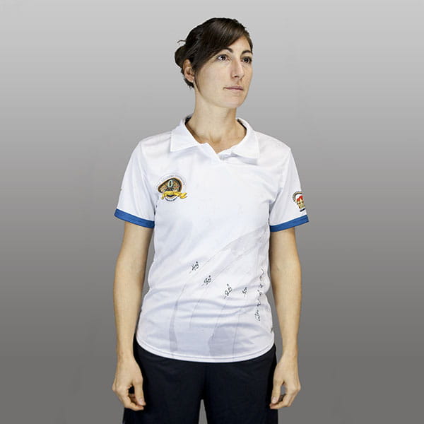 woman wearing a white polo shirt