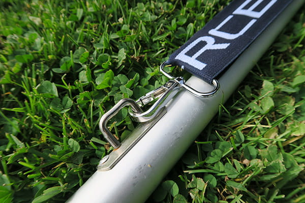 elastic clipping on pole with grass background