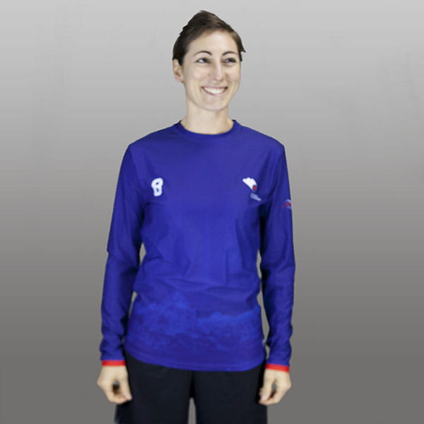 woman wearing a white and blue fitted jersey with long sleeves