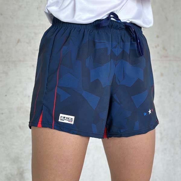 front view of woman legs wearing blue shorts