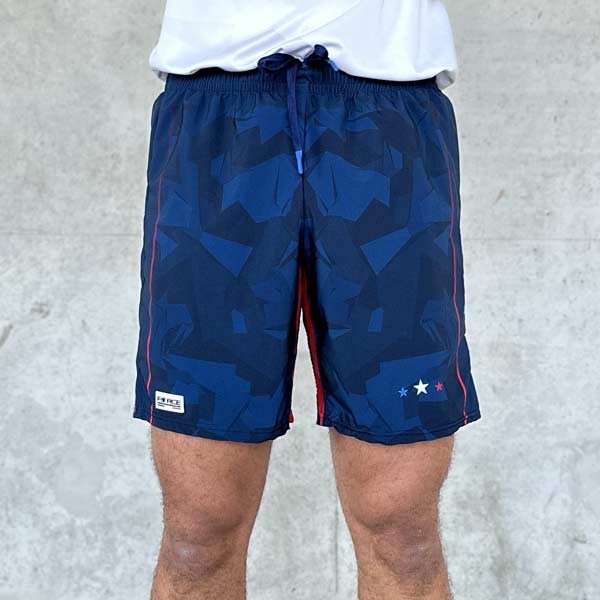 front view of man legs wearing blue shorts