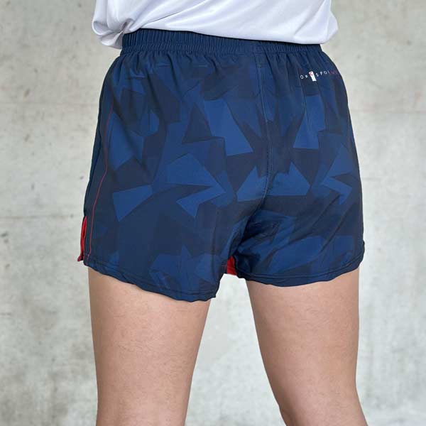 rear view of woman legs wearing blue shorts